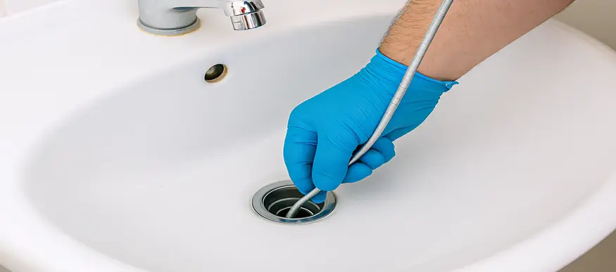 Expert Plumber Team Repairing a Bathroom
